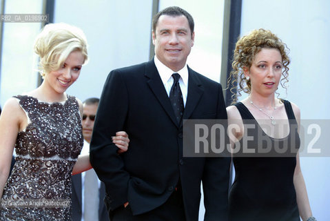 02_09_04 VENICE - 61¡ FILM FESTIVAL - FILM A LOVE SONG FOR A BOBBY LONG. THE ACTOR JOHN TRAVOLTA WITH THE ACTRESS SCARLETT JOHANSSON AND THE DIRECTOR SHAINEE GABEL.©Graziano Arici/Rosebud2 CINEMA