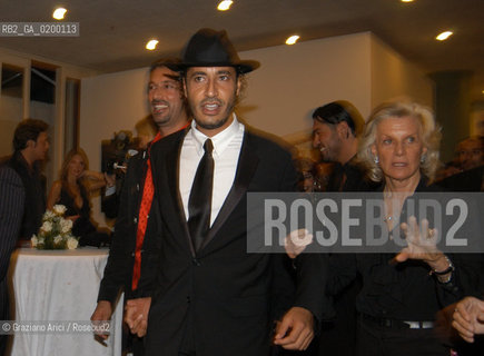 08/09/05 62¡ VENICE FILM FESTIVAL : THE LYBIAN PARTY : THE MOHAMMAR GHEDDAFI SONS SAADI AND MOTHASSAN WITH THE COUNTESS MARINA CICOGNA ©Graziano Arici/Rosebud2