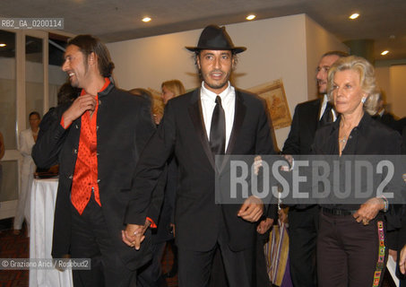 08/09/05 62¡ VENICE FILM FESTIVAL : THE LYBIAN PARTY : THE MOHAMMAR GHEDDAFI SONS SAADI AND MOTHASSAN WITH THE COUNTESS MARINA CICOGNA ©Graziano Arici/Rosebud2