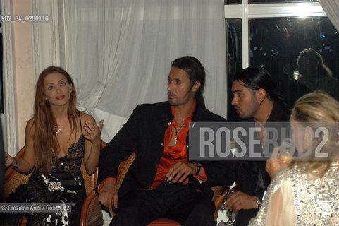 08/09/05 62¡ VENICE FILM FESTIVAL : THE LYBIAN PARTY : THE MOHAMMAR GHEDDAFI SON MOTHASSAN WITH ISABELLA ORSINI ©Graziano Arici/Rosebud2