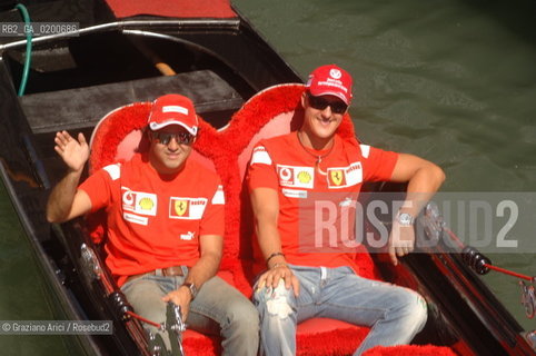 VENICE 6/09/06 - INAUGURATION OF VENICE FERRARI STORE : MICHAEL SHUMACHER AND FELIPE MASSA IN GONDOL IN VENICE ©Graziano Arici/Rosebud2
