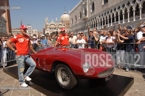 VENICE 6/09/06 - INAUGURATION OF VENICE FERRARI STORE : MICHAEL SHUMACHER AND FELIPE MASSA IN ST. MARKS SQUARE ©Graziano Arici/Rosebud2