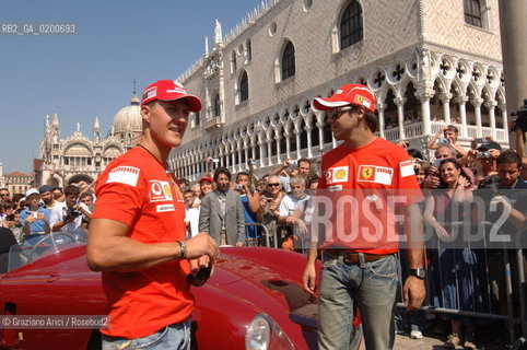 VENICE 6/09/06 - INAUGURATION OF VENICE FERRARI STORE : MICHAEL SHUMACHER AND FELIPE MASSA IN ST. MARKS SQUARE ©Graziano Arici/Rosebud2