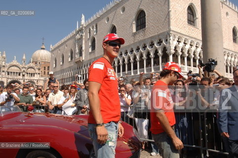 VENICE 6/09/06 - INAUGURATION OF VENICE FERRARI STORE : MICHAEL SHUMACHER AND FELIPE MASSA IN ST. MARKS SQUARE ©Graziano Arici/Rosebud2