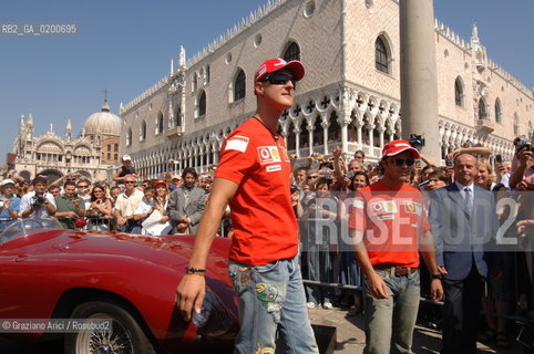 VENICE 6/09/06 - INAUGURATION OF VENICE FERRARI STORE : MICHAEL SHUMACHER AND FELIPE MASSA IN ST. MARKS SQUARE ©Graziano Arici/Rosebud2