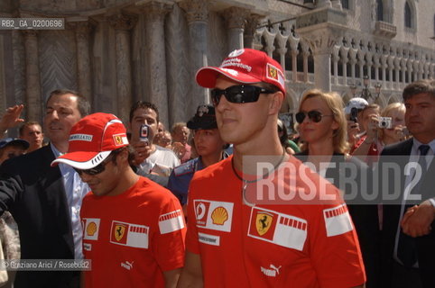 VENICE 6/09/06 - INAUGURATION OF VENICE FERRARI STORE : MICHAEL SHUMACHER AND FELIPE MASSA IN ST. MARKS SQUARE ©Graziano Arici/Rosebud2