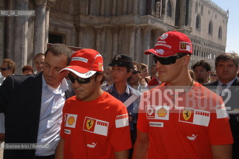 VENICE 6/09/06 - INAUGURATION OF VENICE FERRARI STORE : MICHAEL SHUMACHER AND FELIPE MASSA IN ST. MARKS SQUARE ©Graziano Arici/Rosebud2