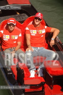 VENICE 6/09/06 - INAUGURATION OF VENICE FERRARI STORE : MICHAEL SHUMACHER AND FELIPE MASSA IN GONDOL IN VENICE ©Graziano Arici/Rosebud2