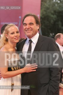 01_9_06 - 63 VENICE FILM FESTIVAL - RED CARPET - FILM WORLD TRADE CENTER - THE DIRECTOR OLIVER STONE WITH THE ACTRESS MARIA BELLO.@ Graziano Arici/Rosebud2