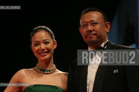 03_09_2007 - VENICE - 64TH FILM FESTIVAL - FILM TAIYANG ZHAOCHANG SHENGQI (THE SUN ALSO RISES) - DIRECTOR AND ACTOR JIANG WEN WITH THE ACTRESS ZHOU YUN ©Graziano Arici/Rosebud2