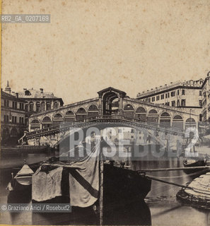 -VENEZIA, SENZA INDICAZIONE DAUTORE, PONTE DI RIALTO, SENZA DATA. POSITIVO ALLALBUMINA MONTATO SU CARTONE, FOTOGRAFIA STEREOSCOPICA, CM 17X8,2  ©ARCHIVIO Graziano Arici/Rosebud2  BARCA, FOTOANTICHE.-VENICE, NO AUTHORS INDICATION, PONTE DI RIALTO, UNDATED. ALBUMEN POSITIVE MOUNTED ON CARDBOARD, STEREOSCOPICAL PHOTOGRAPH CM 17X8,2 ©Graziano Arici / rosebud2 .
