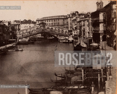 -VENEZIA, SENZA INDICAZIONE DAUTORE, CANAL GRANDE E PONTE DI RIALTO, 1865 C.A. POSITIVO ALLALBUMINA MONTATO SU CARTONE, FOTOGRAFIA STEREOSCOPICA, CM 17,4X8,7  ©ARCHIVIO Graziano Arici/Rosebud2  FOTOANTICHE.-VENICE, NO AUTHORS INDICATION, CANAL GRANDE E PONTE DI RIALTO, 1865 C.A. ALBUMEN POSITIVE MOUNTED ON CARDBOARD, STEREOSCOPICAL PHOTOGRAPH CM 17,4X8,7 ©Graziano Arici / rosebud2 .