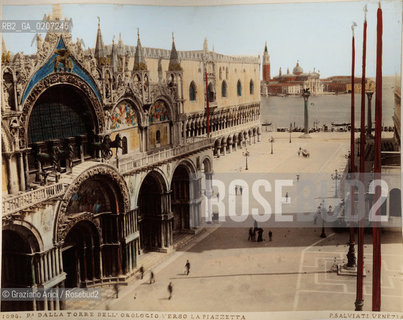 -VENEZIA, PAOLO SALVIATI, PIAZZA DALLA TORRE DELLOROLOGIO VERSO LA PIAZZETTA, SENZA DATA. STAMPA ALLALBUMINA COLORATA A MANO INCOLLATA SU CARTONE, CM 24,5X19,5 CONTENUTE ALLINTERNO DELLALBUM H.F.M.H FROM T.H.H.-IN REMEBRANCE OF A PLEASANT TOUR SEPTEMBER 22nd NOVEMBER15th 1888 DUBLINO. ©ARCHIVIO Graziano Arici/Rosebud2  FOTOANTICHE.-VENICE, PAOLO SALVIATI, PIAZZA DALLA TORRE DELLOROLOGIO VERSO LA PIAZZETTA, UNDATED. ALBUMEN PHOTOGRAPH HAND COLOURED MOUNTED ON CARDBOARD, CM 24,5X19,5 ©Graziano Arici/Rosebud2 