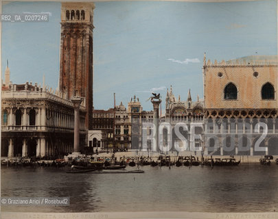 -VENEZIA, PAOLO SALVIATI, PIAZZETTA DAL PALAZZO DEL LOYD, SENZA DATA. STAMPA ALLALBUMINA COLORATA A MANO INCOLLATA SU CARTONE, CM 24,5X19,5 CONTENUTE ALLINTERNO DELLALBUM H.F.M.H FROM T.H.H.-IN REMEBRANCE OF A PLEASANT TOUR SEPTEMBER 22nd NOVEMBER15th 1888 DUBLINO. ©ARCHIVIO Graziano Arici/Rosebud2  BACINO FOTOANTICHE.-VENICE, PAOLO SALVIATI, PIAZZA DALLA TORRE DELLOROLOGIO VERSO LA PIAZZETTA, UNDATED. ALBUMEN PHOTOGRAPH HAND COLOURED MOUNTED ON CARDBOARD, CM 24,5X19,5 ©Graziano Arici/Rosebud2 