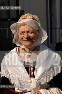ARLES (FRANCE, PROVENCE) 1 MAY 2008 - 1 MAY HOLIDAY - FETE DES GARDIANS - HOLIDAY OF THE CAMARGUE CATTLE FARMER IN FRONT OF THE CHURCH OF NOTRE DAME LA MAJOR ©Graziano Arici/Rosebud2 CAVALLO FESTA DEI GARDIANS COSTUME MAGGIO GIOIELLO PROVENZA CAPPELLO BAMBINO GEO