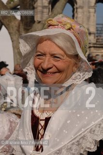 ARLES (FRANCE, PROVENCE) 1 MAY 2008 - 1 MAY HOLIDAY - FETE DES GARDIANS - HOLIDAY OF THE CAMARGUE CATTLE FARMER IN FRONT OF THE CHURCH OF NOTRE DAME LA MAJOR ©Graziano Arici/Rosebud2 CAVALLO FESTA DEI GARDIANS COSTUME MAGGIO GIOIELLO PROVENZA CAPPELLO BAMBINO GEO