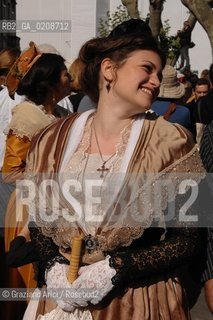 ARLES (FRANCE, PROVENCE) 1 MAY 2008 - 1 MAY HOLIDAY - FETE DES GARDIANS - HOLIDAY OF THE CAMARGUE CATTLE FARMER IN FRONT OF THE CHURCH OF NOTRE DAME LA MAJOR ©Graziano Arici/Rosebud2 CAVALLO FESTA DEI GARDIANS COSTUME MAGGIO GIOIELLO PROVENZA CAPPELLO BAMBINO GEO