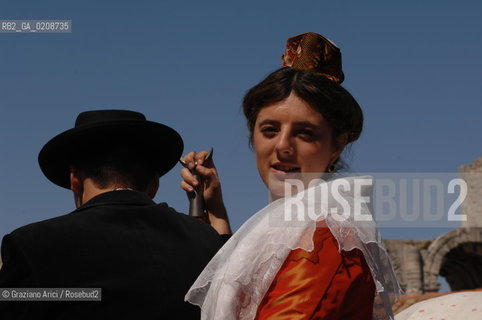 ARLES (FRANCE, PROVENCE) 1 MAY 2008 - 1 MAY HOLIDAY - FETE DES GARDIANS - HOLIDAY OF THE CAMARGUE CATTLE FARMER IN FRONT OF THE CHURCH OF NOTRE DAME LA MAJOR ©Graziano Arici/Rosebud2 CAVALLO FESTA DEI GARDIANS COSTUME MAGGIO GIOIELLO PROVENZA CAPPELLO BAMBINO GEO