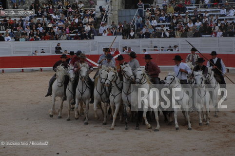 ARLES (FRANCE, PROVENCE) 1 MAY 2008 - 1 MAY HOLIDAY - FETE DES GARDIANS - HOLIDAY OF THE CAMARGUE CATTLE FARMER AND ELECTION OF ARLES QUEEN ROMAN ARENA ©Graziano Arici/Rosebud2 CAVALLO FESTA DEI GARDIANS COSTUME MAGGIO GIOIELLO PROVENZA CAPPELLO BAMBINO COURSE CAMARGUESE TORO GEO
