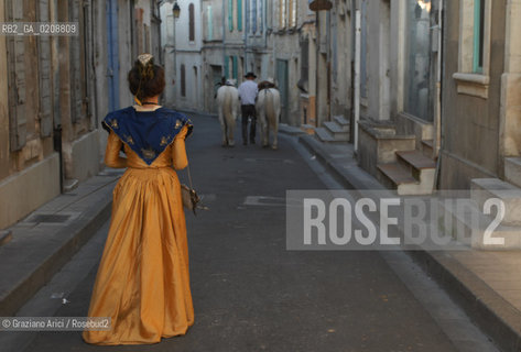 ARLES (FRANCE, PROVENCE) 1 MAY 2008 - 1 MAY HOLIDAY - FETE DES GARDIANS - HOLIDAY OF THE CAMARGUE CATTLE FARMER AND ELECTION OF ARLES QUEEN ROMAN ARENA ©Graziano Arici/Rosebud2 CAVALLO FESTA DEI GARDIANS COSTUME MAGGIO GIOIELLO PROVENZA CAPPELLO BAMBINO COURSE CAMARGUESE TORO GEO