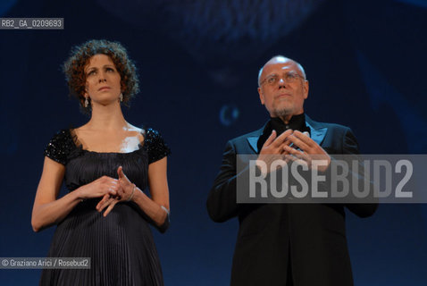 VENICE, 27.08.08. 65th VENICE INTERNATIONAL FILM FESTIVAL. OPENING EVENING. THE HOST OF THE FESTIVAL, THE ACTRESS KSENIA RAPPOPORT  AND THE DIRECTOR OF THE VENICE FILM FESTIVAL MARCO MULLER © MARTABUSO/ARICI/GRAZIANERI CINEMA DIRETTORE