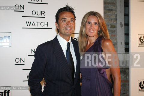 26/08/08 - 65 VENICE FILM FESTIVAL - PARTY BELLSTAFF AT THE GIUDECCA: TIZIANA ROCCA E GIULIO BASE @ Graziano Arici / rosebud2 CINEMA BIENNALE ©Graziano Arici/Rosebud2 BIENNALE CINEMA