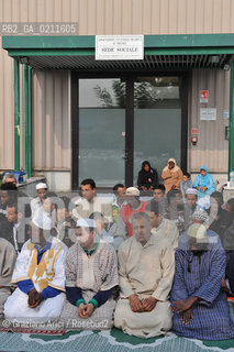 TREVISO 17/10/08 - THE FRIDAY PRAYER OF THE ISLAMIC COMMUNITY OF TREVISO - THE ISLAMIC COMMUNITY IS NOT ALLOWED TO USE HIS OWN SPACE IN VILLORBA (TV) FOR THE PRAYER. SO THE MUSLIMS MUST PRAY IN THE PARKING IN FRONT OF THE BUILDING.©Graziano Arici/Rosebud2 MUSSULMANO RELIGIONE ISLAMICO PREGHIERA MOSCHEA
