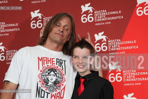 Italy, Venice - September 03, 2009.66th VENICE INTERNATIONAL FILM FESTIVAL - FILM: THE ROAD. ACTORS VIGGO MORTENSEN (T-SHIRT) AND KODI SMIT-McPHEE