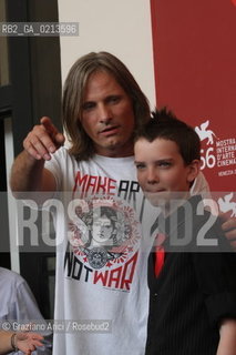 Italy, Venice - September 03, 2009.66th VENICE INTERNATIONAL FILM FESTIVAL - FILM: THE ROAD. ACTORS VIGGO MORTENSEN (T-SHIRT) AND KODI SMIT-McPHEE