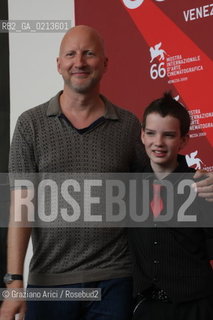 Italy, Venice - September 03, 2009.66th VENICE INTERNATIONAL FILM FESTIVAL - FILM: THE ROAD. THE DIRECTOR JOHN HILLCOAT WITH THE ACTOR KODI SMIT-McPHEE