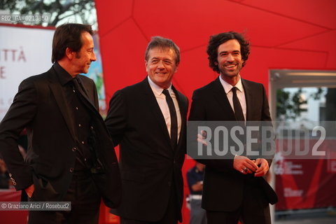Italy, Venice - September 05th, 2009.66th VENICE INTERNATIONAL FILM FESTIVAL - FILM: PERSÉCUTION. THE DIRECTOR PATRICE CHÉREAU (CENTER) WITH THE ACTORS ROMAIN DURIS (RIGHT) AND JEAN-HUGUES ANGLADE  AT THE RED CARPET