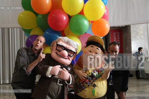 Italy, Venice - September 06th, 2009.66th VENICE INTERNATIONAL FILM FESTIVAL - FILM: GOLDEN LION FOR LIFETIME ACHIEVEMENT TO JOHN LASSETER AND THE PIXAR DIRECTORS. THE DIRECTORS PETE DOCTER AND JONAS RIVERA WITH THE CHARACTERS CARL FREDRICKSEN AND RUSSELL