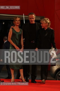 Italy, Venice - September 06th, 2009.66th VENICE INTERNATIONAL FILM FESTIVAL - FILM:WHITE MATERIAL. RED CARPET - LEFT TO RIGHT: THE ACTRESS ISABELLE HUPPERT, THE ACTOR CHRISTOPHER LAMBERT AND THE DIRECTOR AND WRITER CLAIRE DENIS