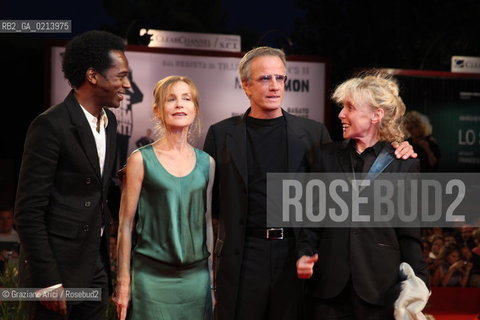 Italy, Venice - September 06th, 2009.66th VENICE INTERNATIONAL FILM FESTIVAL - FILM:WHITE MATERIAL. RED CARPET - LEFT TO RIGHT: THE ACTOR WILLIAM NADYLAM, THE ACTRESS ISABELLE HUPPERT, THE ACTOR CHRISTOPHER LAMBERT AND THE DIRECTOR AND WRITER CLAIRE DENIS