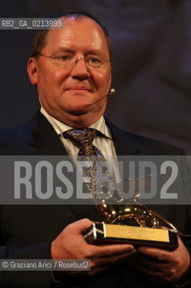 Italy, Venice - September 06th, 2009.66th VENICE INTERNATIONAL FILM FESTIVAL - GOLDEN LION FOR LIFETIME ACHIEVEMENT TO JOHN LASSETER AND THE PIXAR DIRECTORS..THE DIRECTOR JOHN LASSETER WITH THE PRIZE.