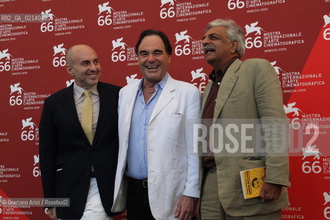 Italy, Venice - September 06th, 2009.66th VENICE INTERNATIONAL FILM FESTIVAL - FILM: SOUTH OF THE BORDER. THE DIRECTOR OLIVER STONE WITH THE SCREENWRITER TARIQ ALI (RIGHT) AND THE PRODUCER.