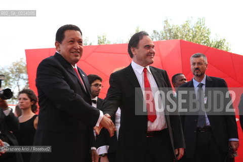 Italy, Venice - September 06th, 2009.66th VENICE INTERNATIONAL FILM FESTIVAL - RED CARPET FILM: SOUTH OF THE BORDER. THE DIRECTOR OLIVER STONE WITH THE VENEZUELAS PRESIDENT UGO CHAVEZ