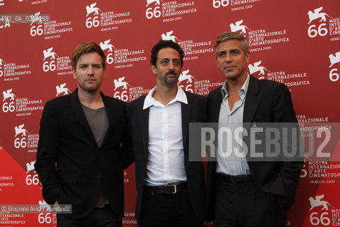 Italy, Venice - September 08th, 2009.66th VENICE INTERNATIONAL FILM FESTIVAL - FILM: THE MEN WHO STARE AT GOATS. THE DIRECTOR GRANT HESLOV BETWEEN THE ACTORS GEORGE CLOONEY AND EWAN MCGREGOR.