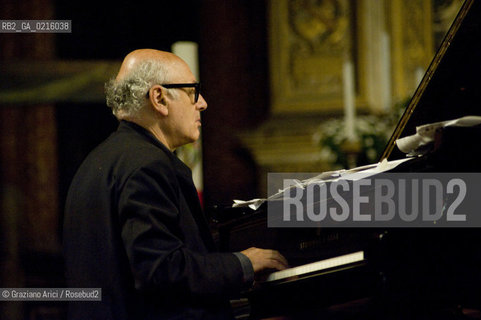 Venice 13/5/10 - The composer and pianist Michael Nyman in concert in Frari Church in Venice, in front of the well-known Tizianòs painting Assunta musica pianista ©Graziano Arici/Rosebud2