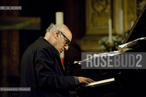 Venice 13/5/10 - The composer and pianist Michael Nyman in concert in Frari Church in Venice, in front of the well-known Tizianòs painting Assunta musica pianista ©Graziano Arici/Rosebud2