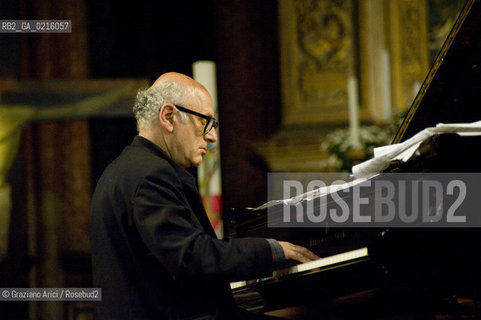 Venice 13/5/10 - The composer and pianist Michael Nyman in concert in Frari Church in Venice, in front of the well-known Tizianòs painting Assunta musica pianista ©Graziano Arici/Rosebud2