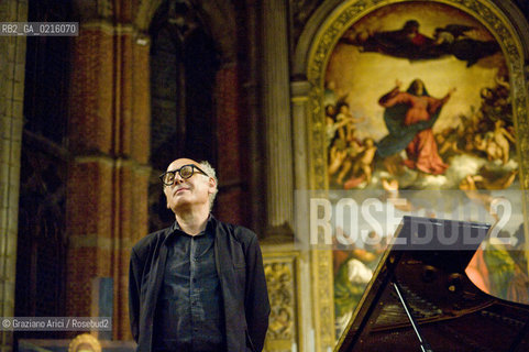 Venice 13/5/10 - The composer and pianist Michael Nyman in concert in Frari Church in Venice, in front of the well-known Tizianòs painting Assunta musica pianista ©Graziano Arici/Rosebud2