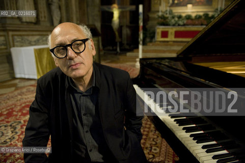 Venice 13/5/10 - The composer and pianist Michael Nyman in concert in Frari Church in Venice, in front of the well-known Tizianòs painting Assunta musica pianista ©Graziano Arici/Rosebud2