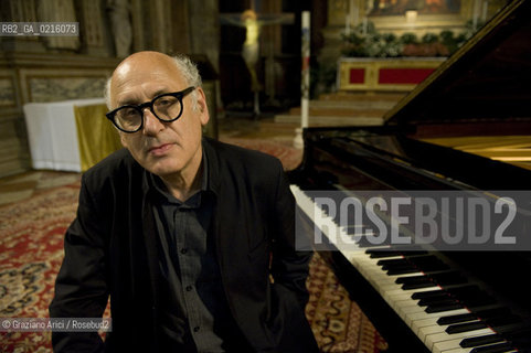 Venice 13/5/10 - The composer and pianist Michael Nyman in concert in Frari Church in Venice, in front of the well-known Tizianòs painting Assunta musica pianista ©Graziano Arici/Rosebud2