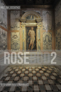 Venice - 12/7/10 - Cà dOro Museum : Wooden grate in front of  St. Sebastian by Andrea Mantegna. The wooden grate was put by an architect follower of Carlo Scarpa. Museo grata sebastiano ©Graziano Arici/Rosebud2