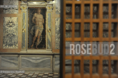 Venice - 12/7/10 - Cà dOro Museum : Wooden grate in front of  St. Sebastian by Andrea Mantegna. The wooden grate was put by an architect follower of Carlo Scarpa. Museo grata sebastiano ©Graziano Arici/Rosebud2