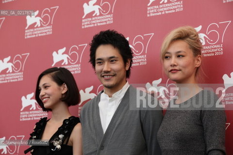 67th Venice International Film Festival - Venice September 2, 2010 - Photocall of the film Noruwei No Mori (Norvegian Wood) - The actor Kenichi Matsuyama and the actresses Rinko Kikuchi (right) and Kiko Mizuhara.