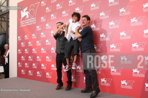 67th Venice International Film Festival - Venice September 2, 2010 - Photocall of the film La Pecora Nera - The director and actor Ascanio Celestini and the actor Giorgio Tirabassi play with the actor Luigi Fedele