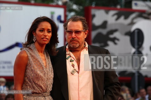 67th Venice International Film Festival - Venice September 2, 2010 - Red Carpet of the film Miral - The director Julian Schnabel with writer Rula Jebreal