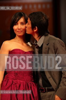 67th Venice International Film Festival - Venice September 2, 2010 - Red Carpet of the film Noruwei No Mori (Norvegian Wood) - The director Tran Anh Hung with his wife